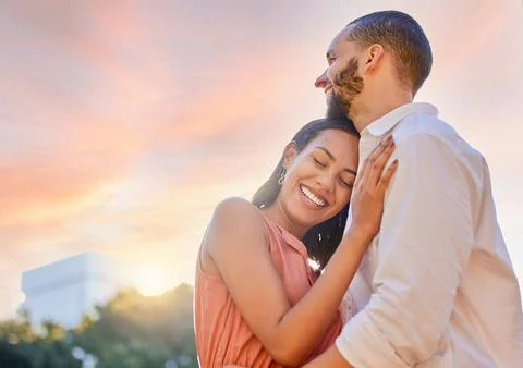 Happy couple hug in sunset, woman with smile and love in Sao Paulo sunshine on Stock Photos