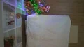 The happy couple kissing on the bed near the christmas tree. view from above 4k or 4k+ Resolution