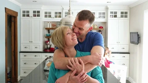 Happy couple in kitchen having fun together Stock-Footage 80315053
