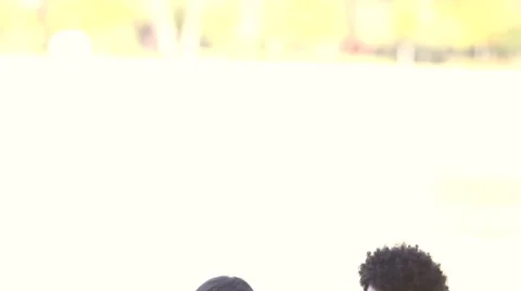 Happy couple listening to music together, sharing earphones Stock Footage 59555607