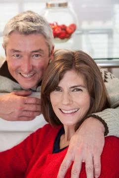 Happy couple looking the camera Stock Photos