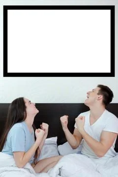 Happy couple looking up at empty copyspace place Stock Photos