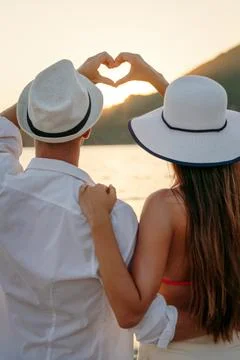 Happy couple in love on honeymoon vacation travel Stock Photos