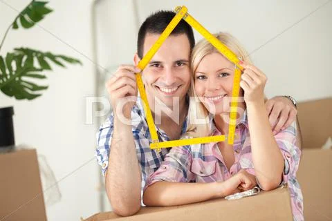 Happy couple in new house Stock-Fotos