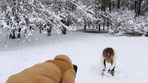 Happy Couple Playing In The Snow Stock Footage 70241657
