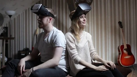 Happy Couple Playing in Virtual Reality Glasses Stock-Footage 74695811