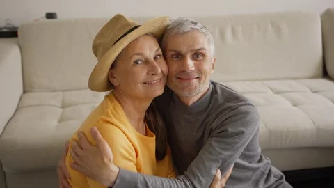 Happy couple posing while packing suitcase Stock Footage 133525006