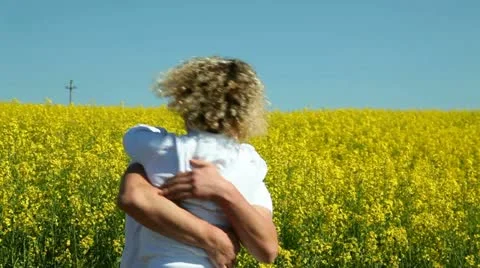 Happy couple on rape field 스톡 동영상 11114553