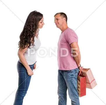 Happy couple with shopping bags Stock Photos