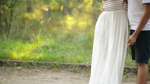 Happy Couple Spending Time Together At The Park. They Have A Lot of Fun Cuddling Stock Footage 101762355