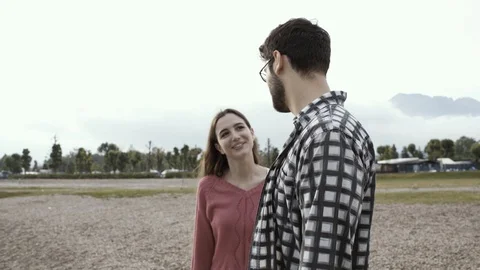 Happy couple spending time together at the lake Stock Footage 127428622