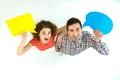 The happy couple stand with dialog signs. View from above Photo