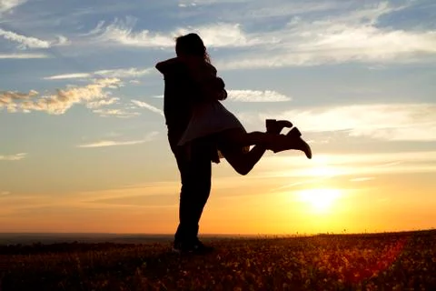 Happy Couple at Sunset Stock Photos