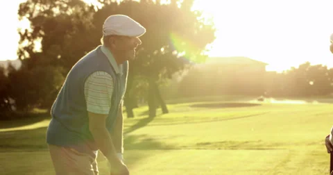 Happy couple teeing off at the golf course Stock Footage 39652236