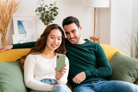 Happy couple using tablet together Stock Photos