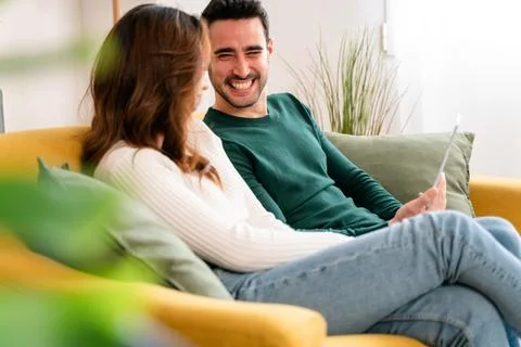 Happy couple using tablet together Foto stock
