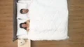 The happy couple wake up in the bed. view from above 4k or 4k+ Resolution
