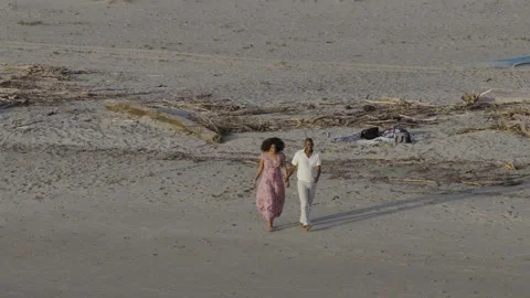 Happy Couple Walks Beach At Sunset Stock Footage 339705446