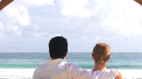 Happy Couple Watching the Ocean Stock Footage 1044851