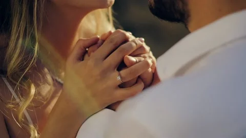 Happy couple's hands, boy holding girl's hands Stock Footage 219613377