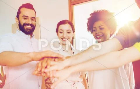 Happy creative team in office Stock Photos
