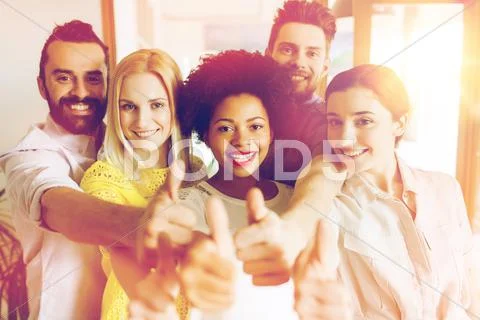 Happy creative team in office Stock Photos