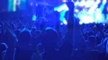 Happy crowd of people jumping in euphoria, enjoying good music at rock show HD Footage
