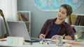 Happy cunning teenager copying homework assignment from internet, cheating HD Footage