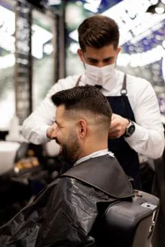 Happy customer in a barber Stock Photos