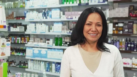 Happy customer looking at a package with their purchases Stock Footage 81603313