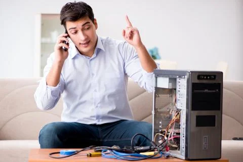Happy customer resolving his computer problem Stock Photos
