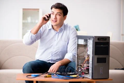 Happy customer resolving his computer problem Stock Photos