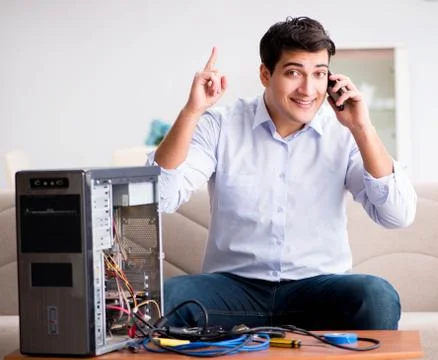 Happy customer resolving his computer problem Stock Photos