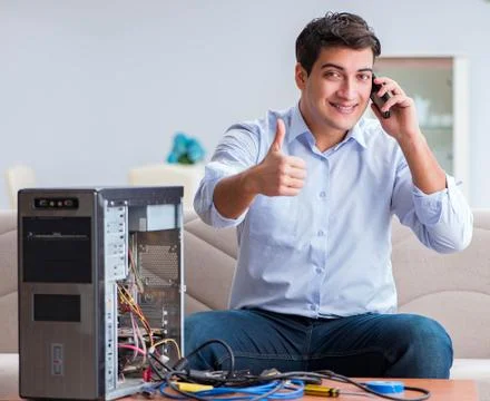 Happy customer resolving his computer problem Stock Photos
