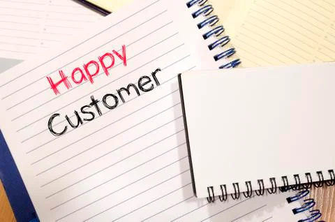 Happy customer text concept on notebook Stock Photos