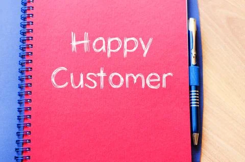 Happy customer write on notebook Stock Photos