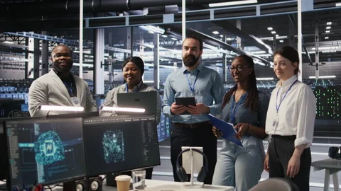 Happy data center engineering team collaborate on neural network implementation Video stock 309624458