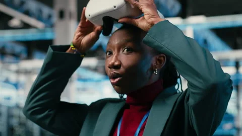 Happy data center technician using VR headset technology, pleased Stock Footage 329713876