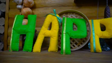 Happy Day from felt letters on fireplace Stock Footage