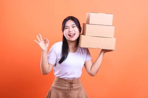 Happy Delivery with Boxes Stock Photos
