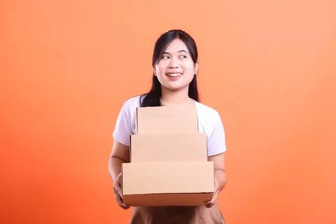 Happy Delivery Worker with Boxes Stock Photos