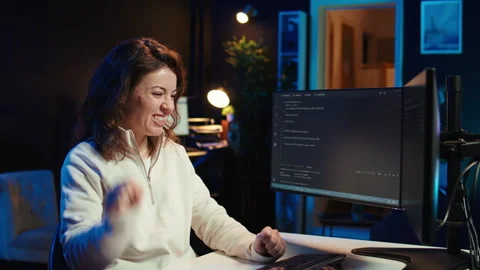 Happy developer celebrating after managing to secure company servers Stock Footage 283593718