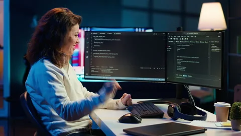 Happy developer celebrating after managing to secure company servers Stock Footage 283691285