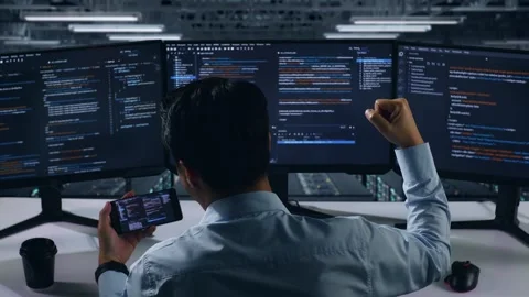 Happy Developer Use Mobile Phone While Write Code In Data Center Stock Footage 270227215