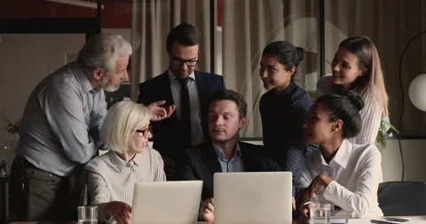 Happy diverse multiracial managers developing company strategy. Video stock 153410141