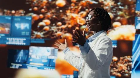 Happy doctor doing key note presentation on medical research data Stock Photos