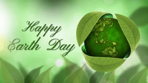 Happy Earth Day Globe Under Leaves 4K Stock Footage 86953589