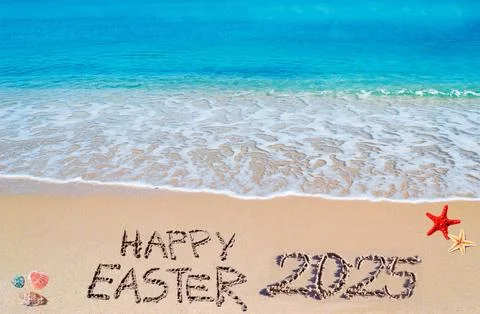 Happy easter 2025 writen on a beach Stock Photos