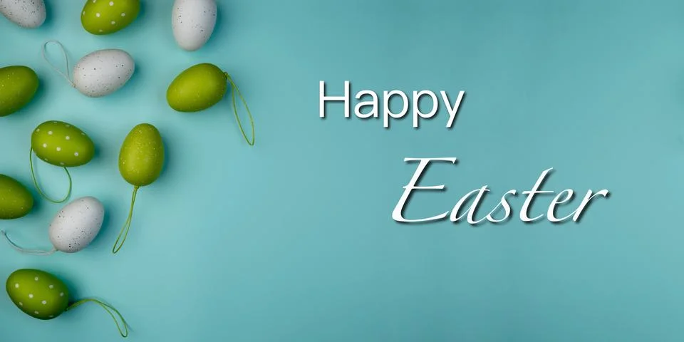 Happy Easter Banner. Colored eggs on blue background. Stock Photos