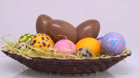 Happy easter. Basket with chocolate and chicken eggs. Stock Footage 124295848